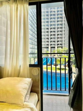 Blue Oikos Aesthetic 1BR Pool view in MOA